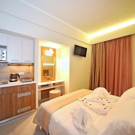 Astron Suites & Apartments คอสทาวน์ ภายนอก รูปภาพ