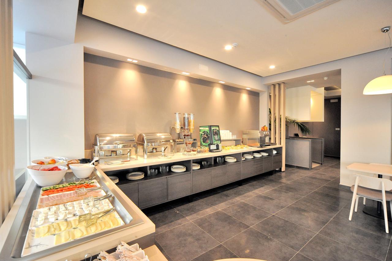 Astron Suites & Apartments คอสทาวน์ ภายนอก รูปภาพ