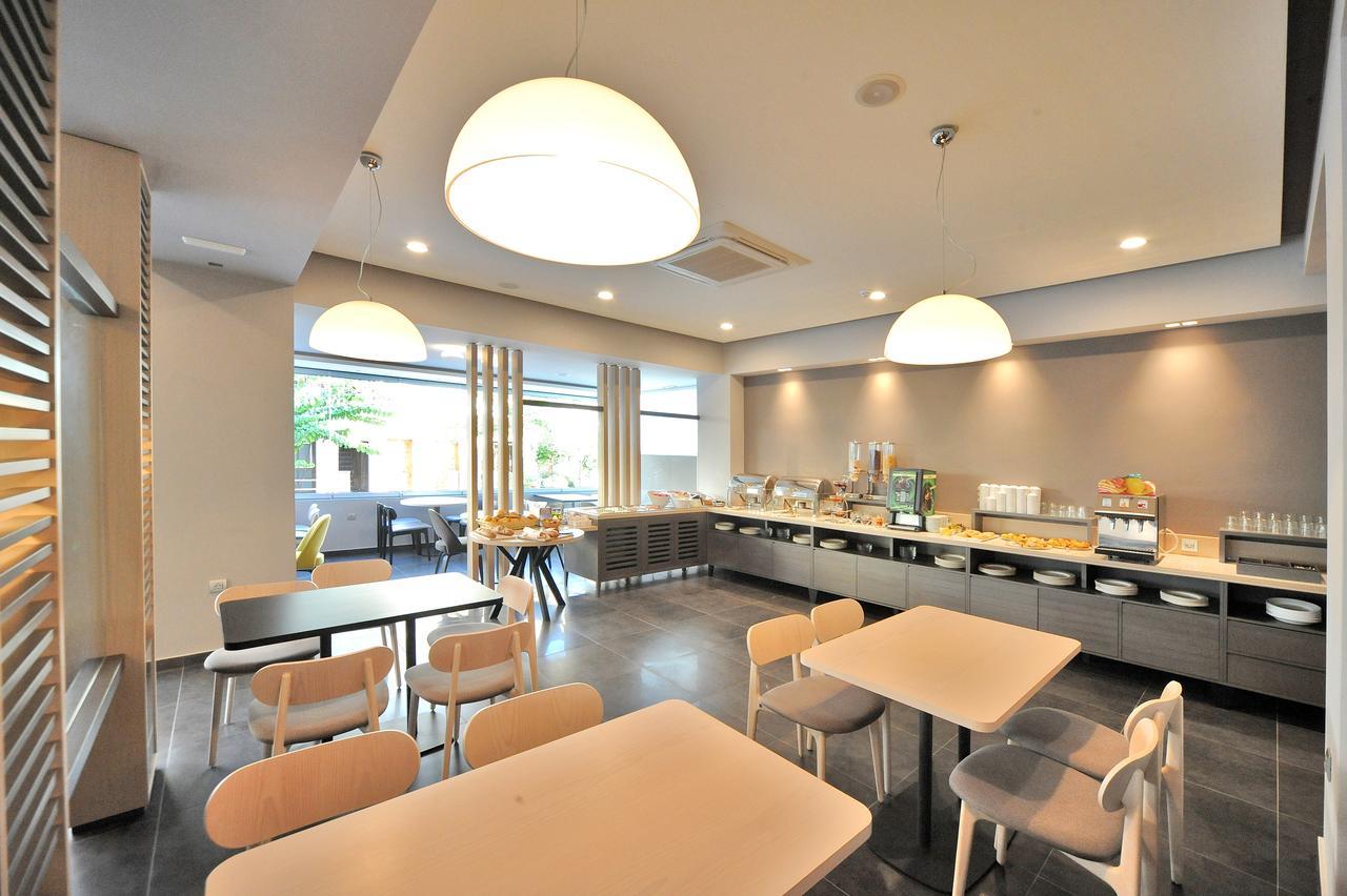 Astron Suites & Apartments คอสทาวน์ ภายนอก รูปภาพ