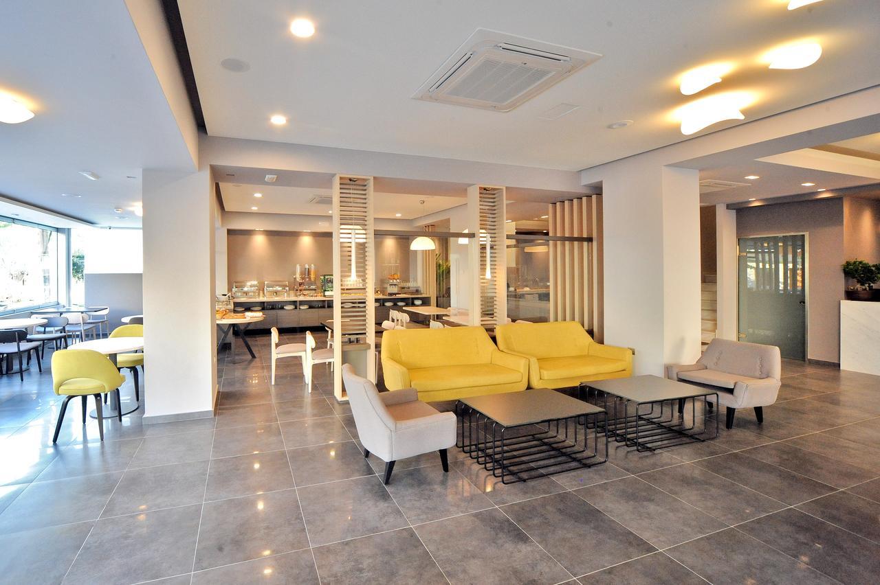 Astron Suites & Apartments คอสทาวน์ ภายนอก รูปภาพ